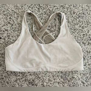 Lululemon white sports bra, criss cross back. Size 10